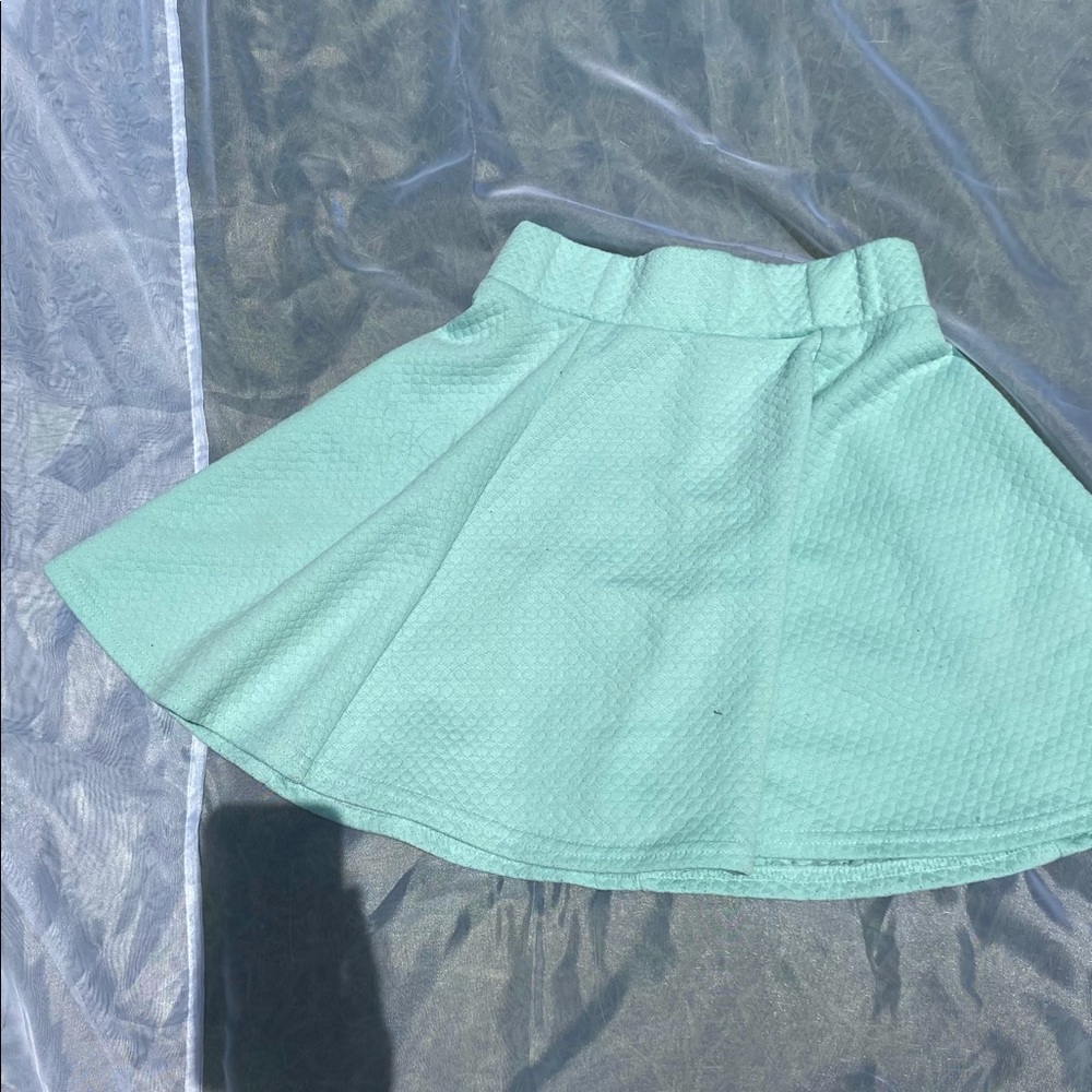 Baby’s blue skirt
